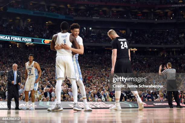 Justin Jackson and Theo Pinson of the North Carolina Tar Heels embrace each other during the 2017 NCAA Photos via Getty Images Men's Final Four...