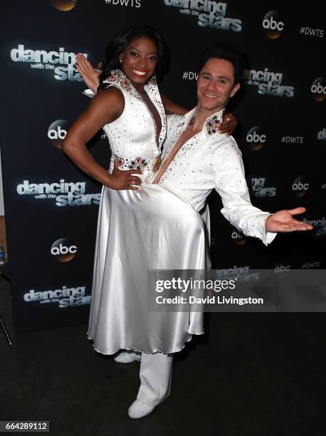 Olympian Simone Biles and dancer Sasha Farber attend "Dancing with the Stars" Season 24 at CBS Televison City on April 3, 2017 in Los Angeles,...