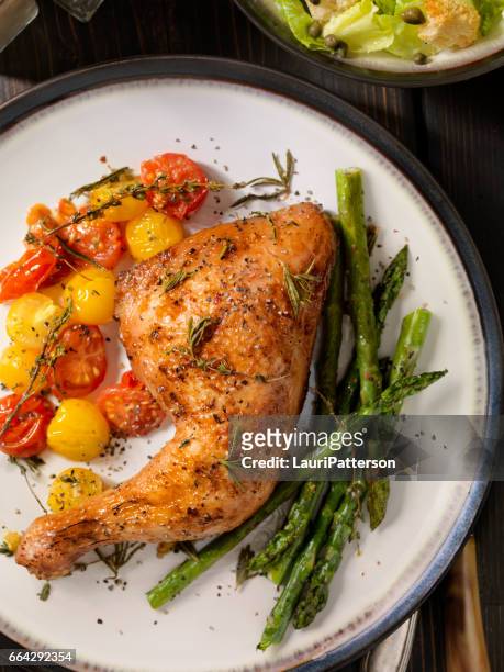 grilled chicken legs with vegetables - cooked turkey white plate imagens e fotografias de stock