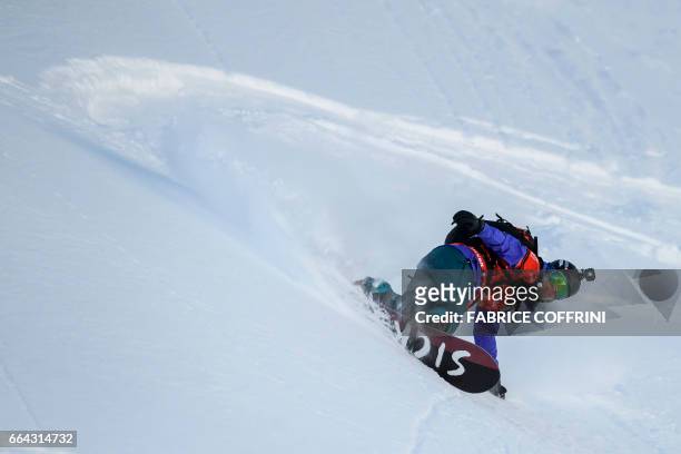 Switzerland's Anne-Flore Marxer competes in the Women's snowboard event during the Verbier Xtreme, Freeride World Tour finals at the Bec des Rosses...