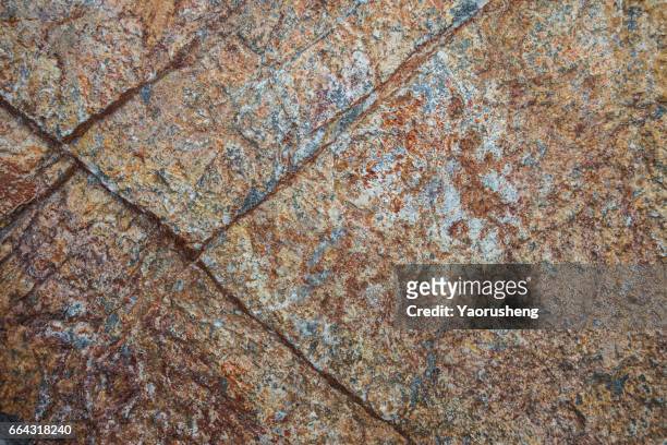 textured grey rock background with rust iron ore and quartz veins - rust texture imagens e fotografias de stock
