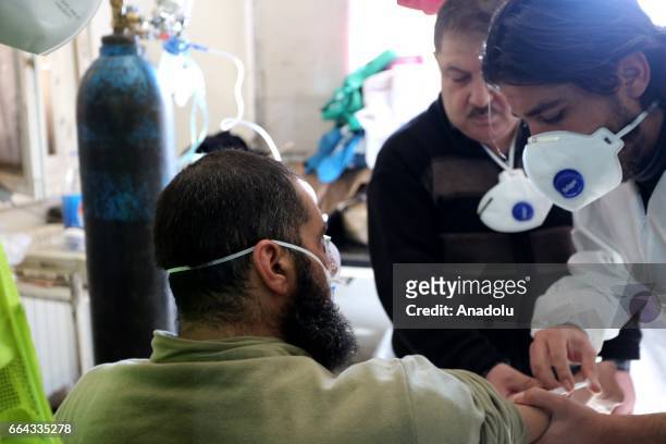 Man gets treatment at a hospital after a suspected chlorine gas attack by Assad Regime forces to Khan Shaykhun town of Idlib, Syria on April 4, 2017.