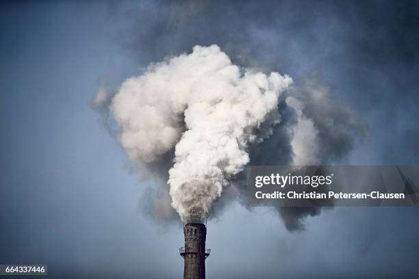 air pollution from chinese factory chimney - coal fired power station stock pictures, royalty-free photos & images