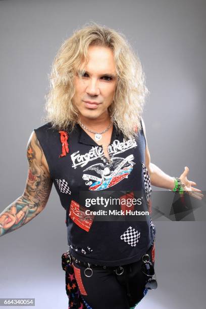 Michael Starr of Steel Panther, studio portrait, Download Festival, 13th June 2010.