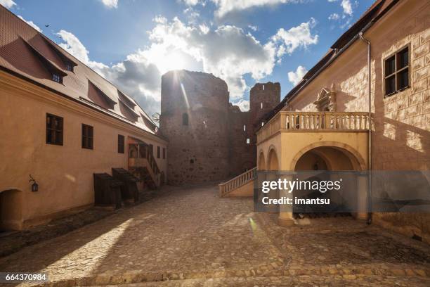 inner courtyard facade of bauska castle - bauska stock pictures, royalty-free photos & images