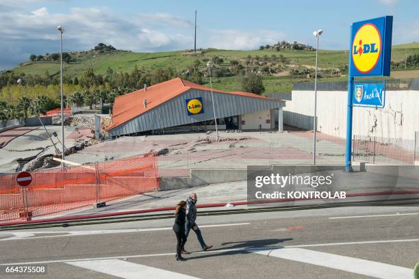 Supermarket Lidl collapsed because of the wide landslide unleashed in recent days by the strong cyclone Neptune rains in the Basilicata, in southern...