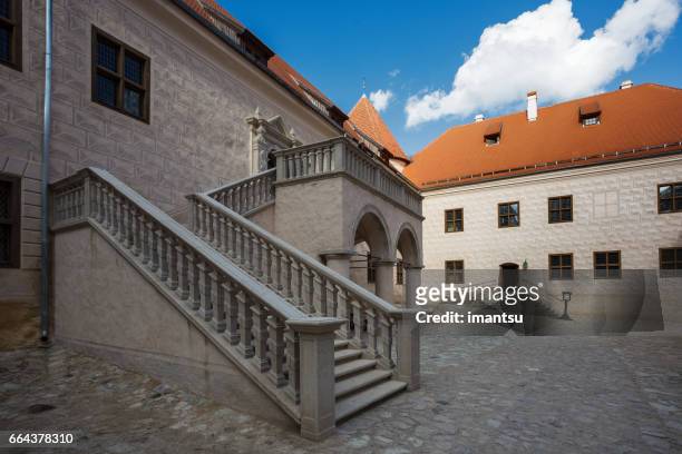 inner courtyard facade of bauska castle - bauska stock pictures, royalty-free photos & images