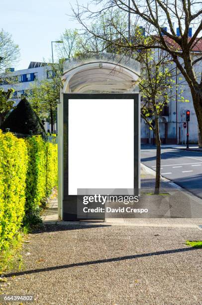 bus stop - bus advertisement stock pictures, royalty-free photos & images