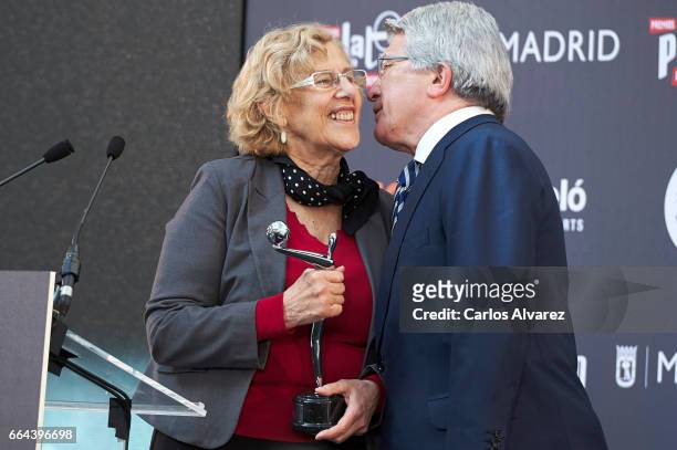 The Mayor of Madrid, Manuela Carmena receives the Platino award to Madrid from producer Enrique Cerezo during the 'Platino Awards 2017' presentation...