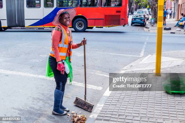 happy lady, a johannesburg street sweeper - road sweeper stock pictures, royalty-free photos & images