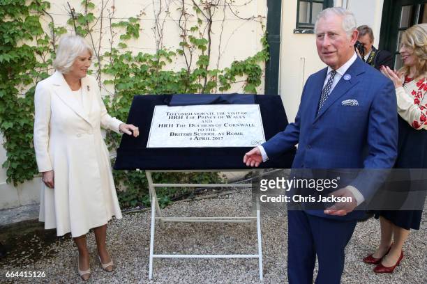 Camilla, Duchess of Cornwall and Prince Charles, Prince of Wales unveil a plaque at The British School on April 4, 2017 in Rome, Italy.