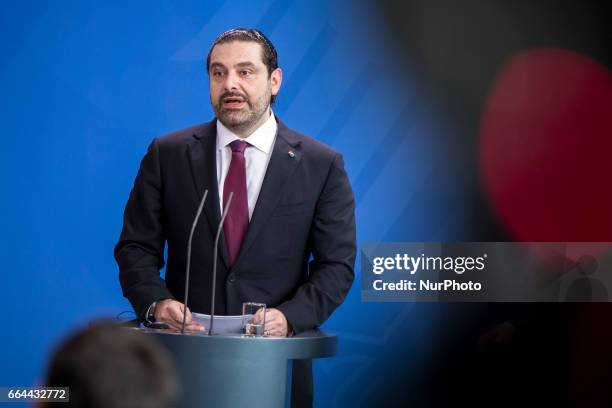 Lebanese Prime Minister Saad Hariri address a statement to the media together with German Chancellor Angela Merkel before a lunch meeting in Berlin,...
