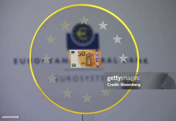 New 50 euro currency bank note is displayed during its unveiling at the European Central Bank headquarters in Frankfurt, Germany, on Tuesday, April...