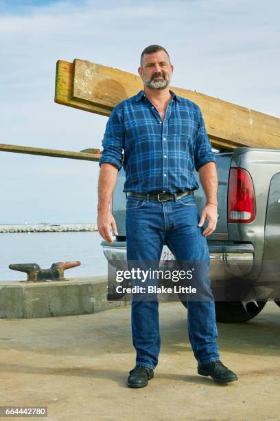 bearded fisherman with truck - plaid shirt stock-fotos und bilder