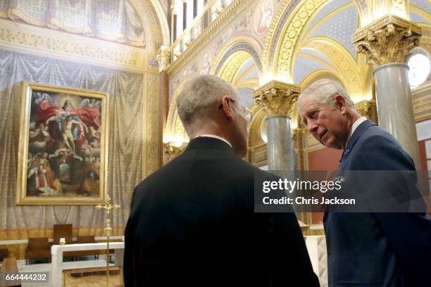 Monsignor Philip Whitmore, Rector shows Prince Charles, Prince of Wales the restored chapel at the Venerable English College on April 4, 2017 in...