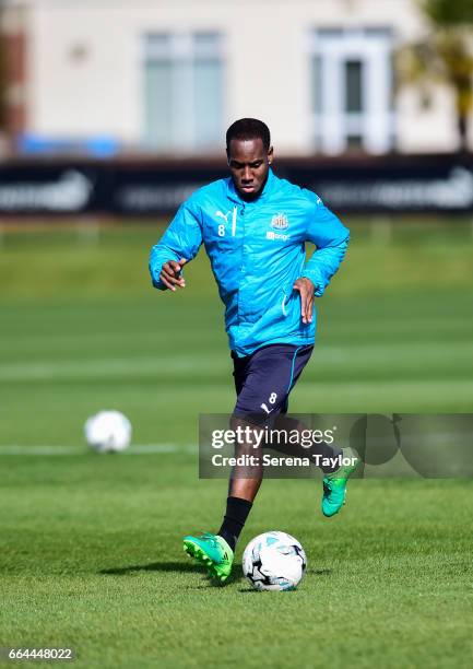 Vurnon Anita runs with the ball during the Newcastle United Training Session at The Newcastle United Training Centre on April 4, 2017 in Newcastle...