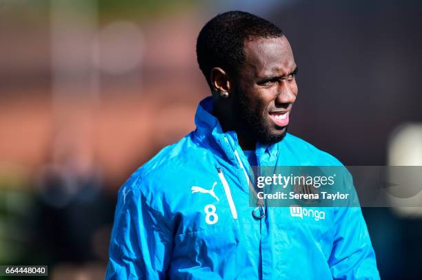 Vurnon Anita smiles as he walks outside during the Newcastle United Training Session at The Newcastle United Training Centre on April 4, 2017 in...