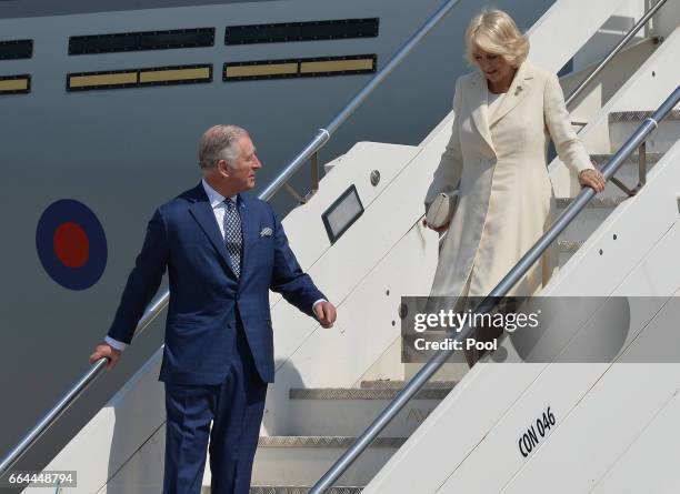 Prince Charles, Prince of Wales and Camilla, Duchess of Cornwall disembark the royal plane on the seventh day of their nine-day European tour on...