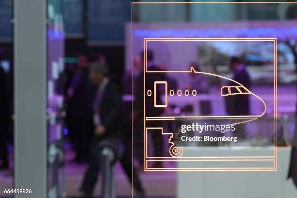 Graphic showing the front of an airliner sits on a screen at the TE Connectivity pavilion at the 2017 Aircraft Interiors Expo in Hamburg, Germany, on...