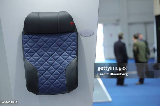 Delta' airline seat cover sits on display at the Sabeti Wain Aerospace pavilion at the 2017 Aircraft Interiors Expo in Hamburg, Germany, on Tuesday,...