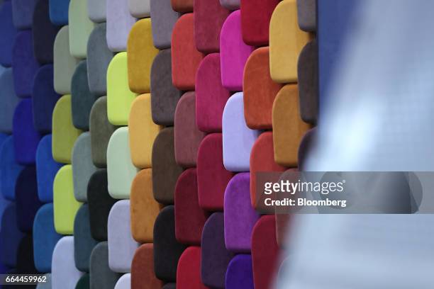 Colored material made from Alcantara SpA fabric sit on display at the Aircraft Interiors Expo in Hamburg, Germany, on Tuesday, April 4, 2017....