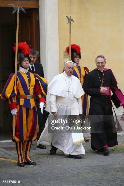 Pope Francis and his personal secretary Georg Gaenswein arrive for the meeting with Prince Charles, Prince of Wales and Camilla, Duchess of Cornwall...