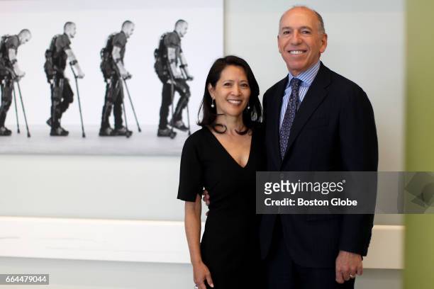 Scott Schoen, right, and his wife Nancy Adams pose for a portrait at Spaulding Rehabilitation Hospital in Boston on Mar. 31, 2017. They gave...