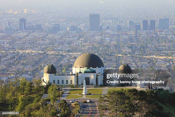 aerial view of griffith observatory and downtown la - griffith park stock pictures, royalty-free photos & images