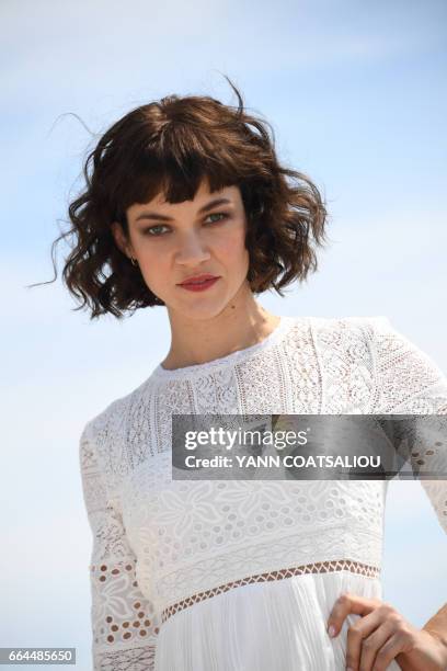 Actress Olivia Ross, performing in "Knightfall" TV drama, poses during the MIPTV event in Cannes, southern France, on April 4, 2017.