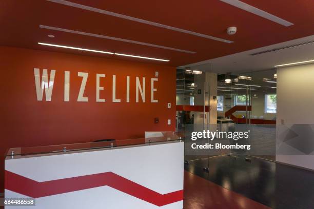 Signage is displayed above the reception desk at the Wizeline Inc. Office in Guadalajara, Mexico, on Friday, March 10, 2017. Guadalajara's Governor...