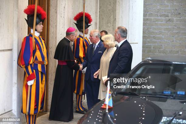 Prince Charles, Prince of Wales and Camilla, Duchess of Cornwall are welcomed by the prefect of the papal household Georg Gaenswein as they arrive at...
