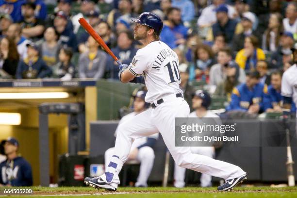 Kirk Nieuwenhuis of the Milwaukee Brewers flies out in the sixth inning against the Colorado Rockies of the MLB Opening Day game at Miller Park on...