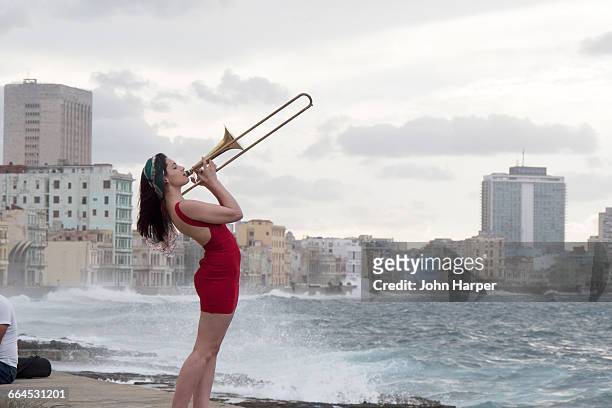 musician on the malecon, havana, cuba - trombone stock pictures, royalty-free photos & images