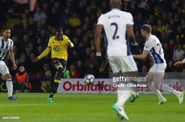 Baye Niang of Watford scores his sides first goal during the Premier League match between Watford and West Bromwich Albion at Vicarage Road on April...