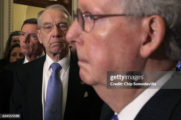 Senate Judiciary Committee Chairman Charles Grassley joins Sen. John Barrasso and Majority Leader Mitch McConnell for a news conference following the...