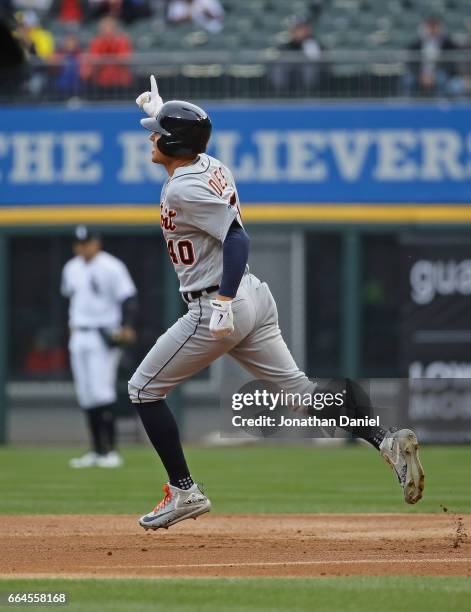 JaCoby Jones of the Detroit Tigers celebrates while running the bases after hitting a three-run home run in the 2nd inning against the Chicago White...