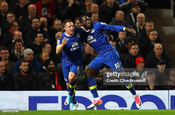 Phil Jagielka of Everton celebrates scoring his sides first goal with Romelu Lukaku of Everton during the Premier League match between Manchester...