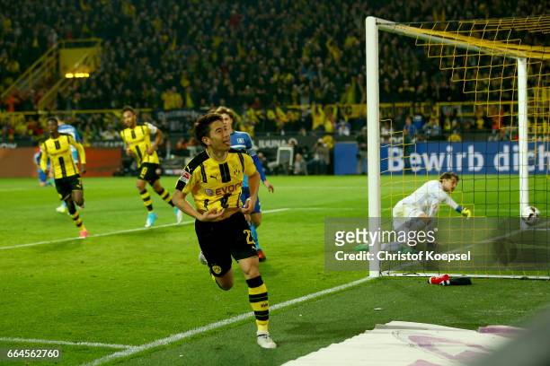Shinji Kagawa of Dortmund celebrates the second goal during the Bundesliga match between Borussia Dortmund and Hamburger SV at Signal Iduna Park on...