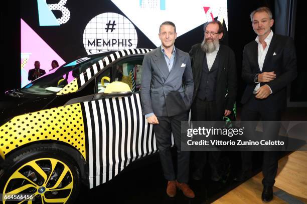 Lapo Elkann, Michele De Lucchi and Adrian van Hooydonk attend Memphis event during Milan Design Week 2017 on April 4, 2017 in Milan, Italy.