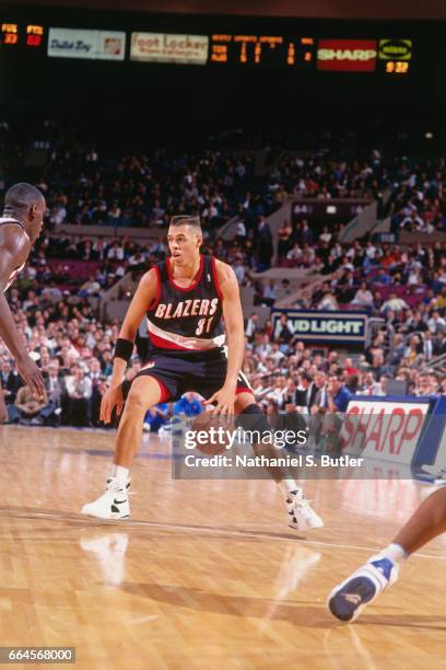 Tracy Murray of the Portland Trail Blazers dribbles against the New York Knicks during a game played circa 1993 at the Madison Square Garden in New...