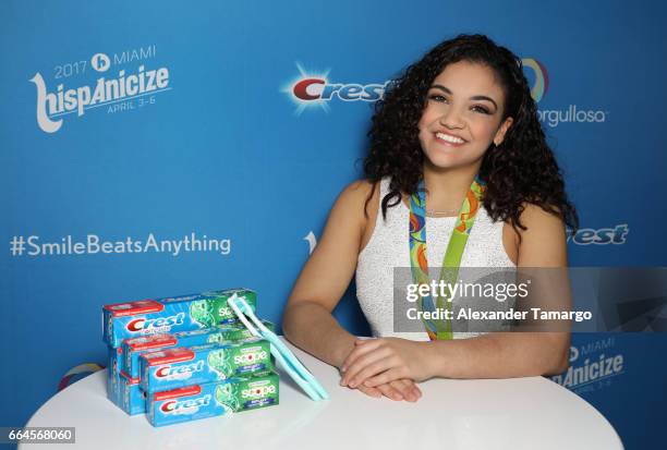 Olympic gymnastics champion and season 23 'Dancing With the Stars' winner Laurie Hernandez poses during a press conference to unveil first-ever Crest...