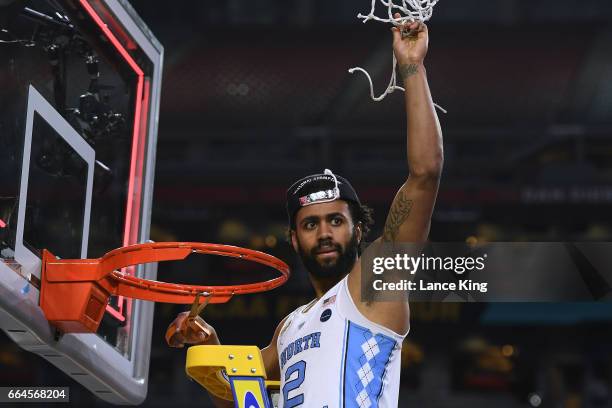 Joel Berry II # of the North Carolina Tar Heels cuts the net following their 71-65 victory against the Gonzaga Bulldogs during the 2017 NCAA Men's...