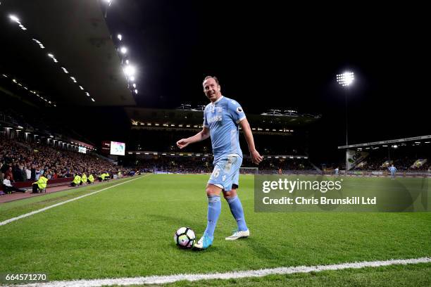 Charlie Adam of Stoke City laughs as he receives abuse from Burnley fans during the Premier League match between Burnley and Stoke City at Turf Moor...