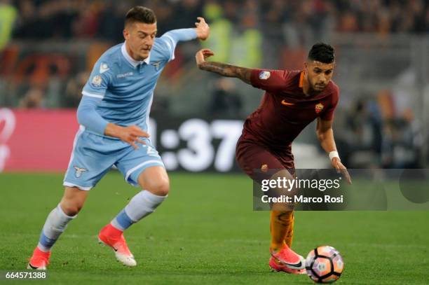 Sergej Milinkovic Savic of SS Lazio battles with Emerson palmieri of AS Roma during the TIM Cup match between AS Roma and SS Lazio at Stadio Olimpico...