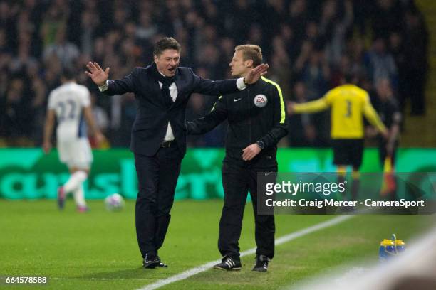 Watford manager Walter Mazzarri reacts to the red card to Watford's Miguel Angel Britos during the Premier League match between Watford and West...