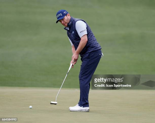 Golfer Branden Grace putts on the 2nd hole during the first day of practice for the 2017 Masters Tournament on April 3 at Augusta National Golf Club...