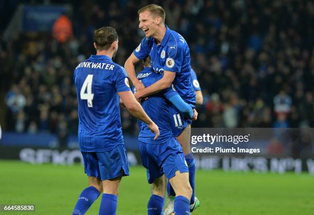 Jamie Vardy of Leicester City celebrates with Marc Albrighton of Leicester City after scoring to make it 2-0 during the Premier League match between...
