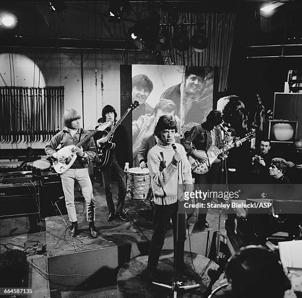 The Rolling Stones rehearsing for an appearance on the TV show, 'Ready Steady Go!', at Television House, London, 26th February 1965. Left to right:...