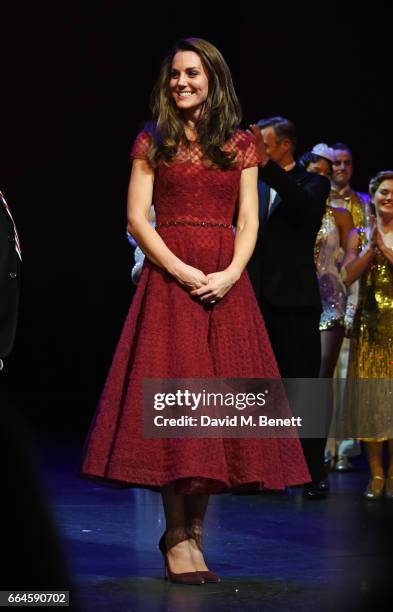 Catherine, Duchess of Cambridge, attends a presentation following the Opening Night Royal Gala performance of "42nd Street" in aid of the East Anglia...