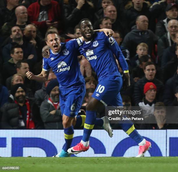 Phil Jagielka of Everton celebrates scoring their first goal during the Premier League match between Manchester United and Everton at Old Trafford on...